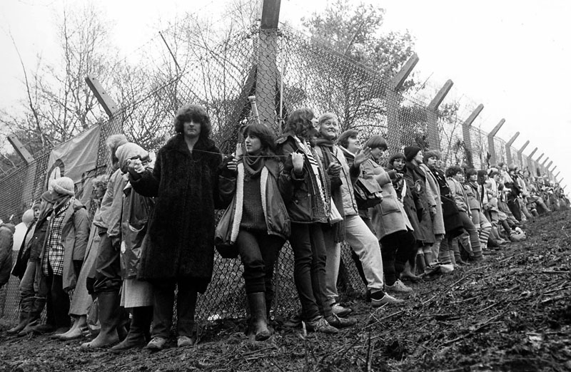 30,000 women joined hands around the base - Embrace the Base. Women protest at Greenham Common USAF American Airforce Base from which cruse missile launchers were deployed. 1982 